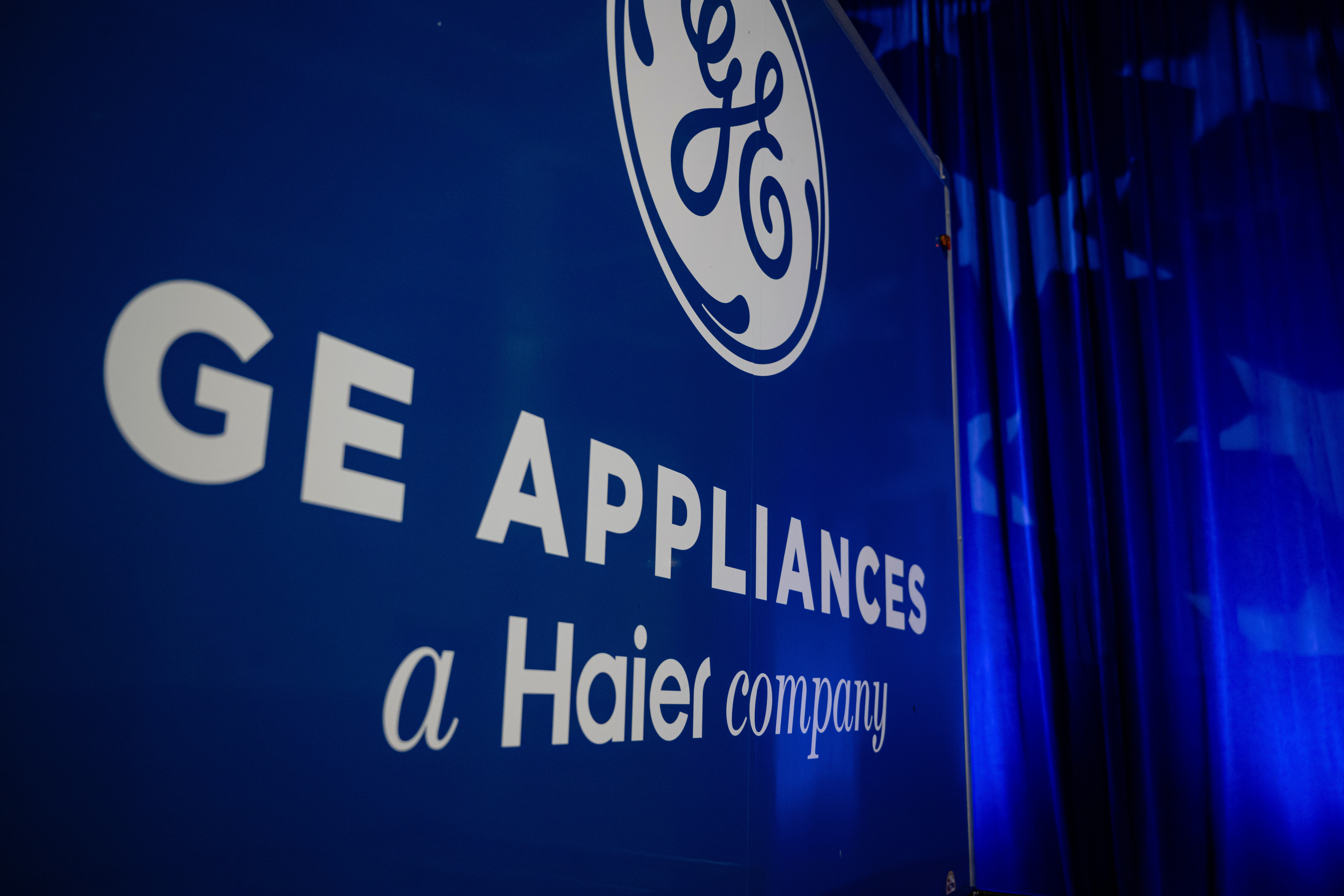 A trailer with the GE logo is seen at a stage area at GE Appliances global headquarters, Aug 13, 2025, in Louisville, Ky.