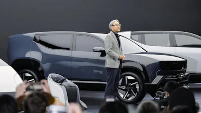 Honda Chief Executive Toshihiro Mibe speaks to the media at Tokyo Mobility Show during a media day at Tokyo Big Sight in Tokyo, on Wednesday, Oct. 29, 2025.