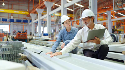 Manufacturing production planners on the factory floor.