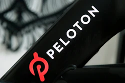 The Peloton logo is seen on the company's stationary bicycle in San Francisco, Calif., Nov. 19, 2019.