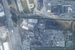 This satellite image from Planet Labs PBC shows the crash site of a UPS McDonnell Douglas MD-11 aircraft just south of Muhammad Ali International Airport, in Louisville, Ky., Monday, Nov. 10, 2025.