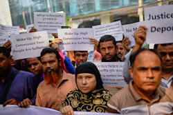 Bangladeshi workers who were employed by Malaysian companies protest in front of the Ministry of Expatriates' Welfare and Overseas Employment demanding unpaid wages, fair compensation and an end to alleged abuse by Malaysian employers, in Dhaka, Bangladesh, Monday, Nov. 10, 2025.