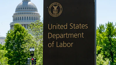 In this May 7, 2020, file photo, the entrance to the Labor Department is seen near the Capitol in Washington.