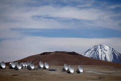 Radio antennas are spread out on the terrain as part of one of the world's largest astronomy projects, the Atacama Large Millimeter/submillimeter Array (ALMA) in Chajnator in the Atacama desert in northern Chile, Sept. 27, 2012.