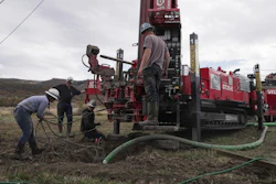 Matt Cooper and his kids Anna, Nathan and Matthew prepare to drill a hole for a geothermal heat pump installation Thursday, Oct. 9, 2025, in Hamilton, Colo.