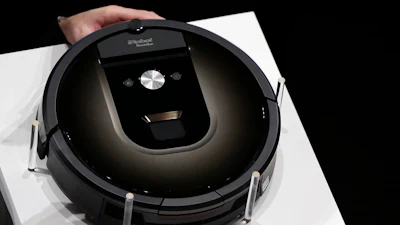 A Roomba 980 vacuum cleaning robot is presented during a presentation in Tokyo, on Sept. 29, 2015.