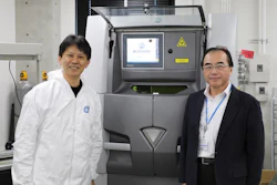 Naoki Takata of Nagoya University, lead researcher on the project (left), and Masaki Kato, senior author and division head of Aichi Center for Industry and Science Technology (right), with the center's laser 3D printer that creates stronger, heat-resistant aluminum alloys layer by layer.