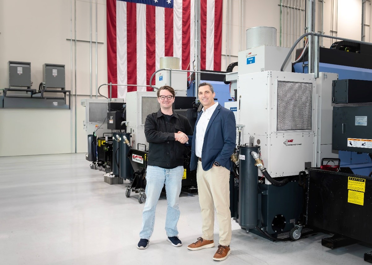 Tom Carrubba (right), vice president of production operations at Lockheed Martin, and Chris Power (left), CEO of Hadrian, agree to a Memorandum of Understanding at Hadrian&rsquo;s headquarters in Los Angeles.