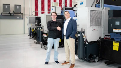 Tom Carrubba (right), vice president of production operations at Lockheed Martin, and Chris Power (left), CEO of Hadrian, agree to a Memorandum of Understanding at Hadrian’s headquarters in Los Angeles.