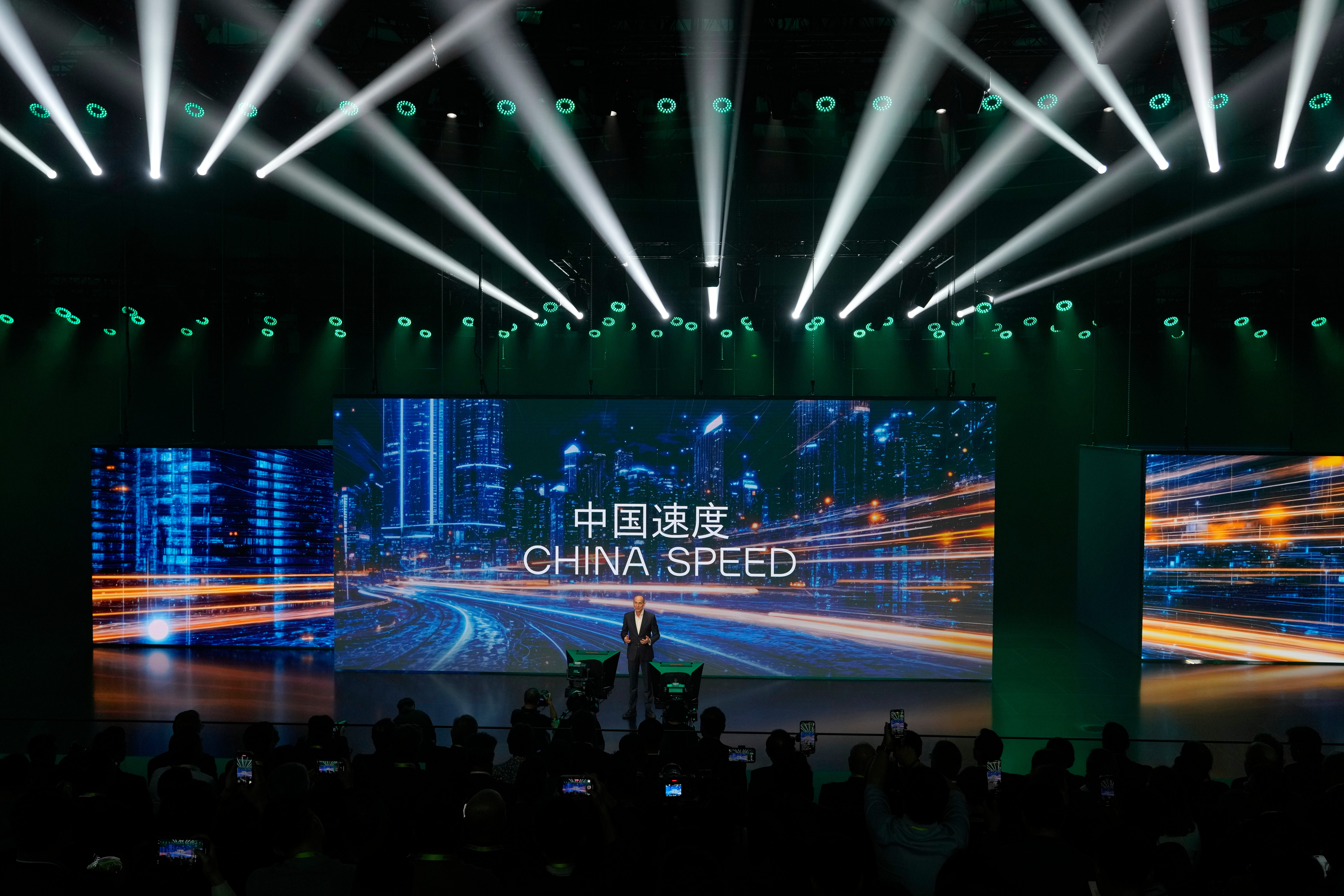 Ralf Brandstatter, Chairman and CEO of Volkswagen Group China, speaks near the slogan 'China Speed' during the Volkswagen Group media night ahead of the Auto Show in Shanghai, April 22, 2025.