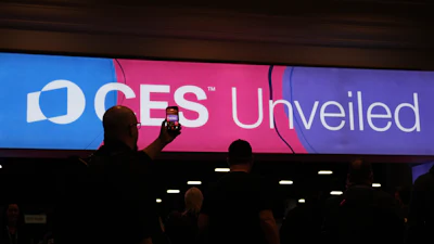 People arrive at the CES Unveiled tech show Sunday, Jan. 4, 2026, in Las Vegas.