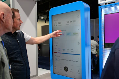 People look at a display of the Bosch eBike Flow app at the Bosch booth during the CES tech show Wednesday, Jan. 7, 2026, in Las Vegas.