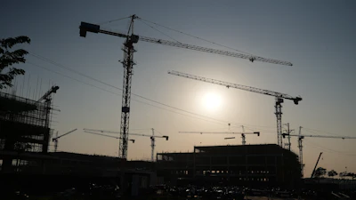 Multiple cranes are placed at a construction site at Yen Phong Industrial Park in Bac Ninh province, Vietnam, on Dec. 26, 2025.