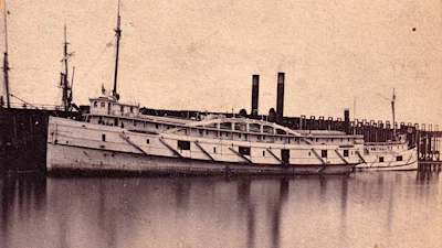 This image of an original photo print provided by Brendon Baillod shows the Lac La Belle docked at Marquette, Mich., in 1866.