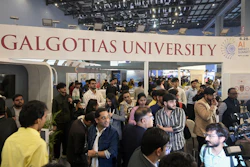 People visit Galgotias University stall at AI summit ahead of an eviction order issued by Indian authorities, in New Delhi, India, Wednesday, Feb. 18, 2026.