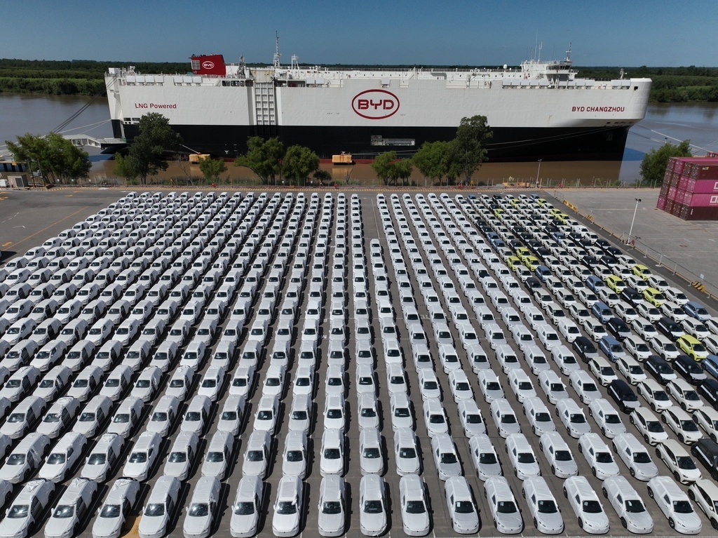 The BYD Changzhou car carrier is docked at Terminal Zarate in the Buenos Aires province of Argentina, Tuesday, Jan. 20, 2026, where hybrid and electric vehicles shipped from China are parked next to the ship.
