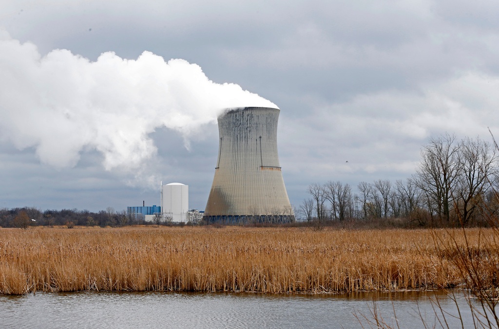 Plumes of steam drift from the cooling tower of FirstEnergy Corp.'s Davis-Besse Nuclear Power Station in Oak Harbor, Ohio, April 4, 2017.