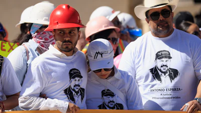 Relatives of Antonio Esparza, one of 10 mine workers abducted in neighboring Sinaloa state, during protest march in Hermosillo, Mexico, Saturday, Feb. 14, 2026.
