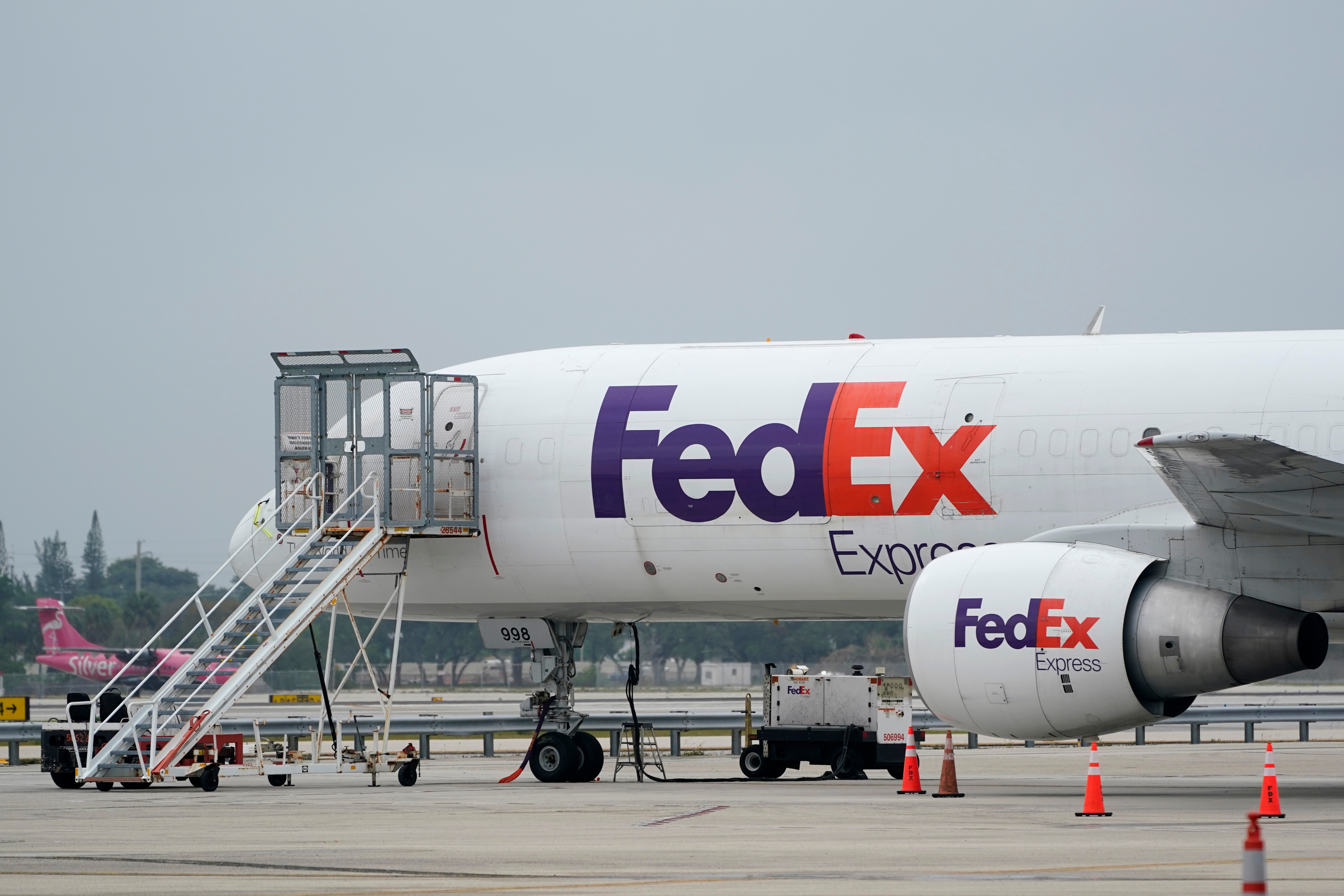 A FedEx cargo plane on the tarmac at Fort Lauderdale-Hollywood International Airport, Fort Lauderdale, Fla., April 20, 2021.