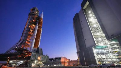 NASA's Artemis II SLS (Space Launch System) moon rocket with the Orion spacecraft slowly rolls back towards the Vehicle Assembly Building at the Kennedy Space Center, Wednesday, Feb. 25, 2026, in Cape Canaveral, Fla.