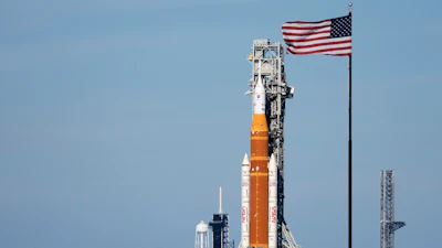NASA's Artemis II SLS (Space Launch System) moon rocket with the Orion spacecraft slowly rolls back towards the Vehicle Assembly Building at the Kennedy Space Center, Feb. 25, 2026, in Cape Canaveral, Fla.