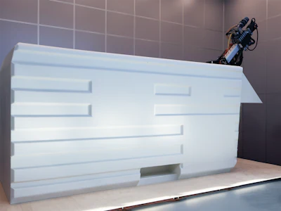 The Cab was printed as a single piece on Heron AM, Caracol's robotic large-format additive manufacturing platform.
