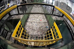 Ground up plastics that Alterra Energy receives from recycling facilities, move along a conveyor at the start of their process that transforms the material into a liquid that is then used in the manufacturing of plastic in Akron, Ohio, Sept. 8, 2022.