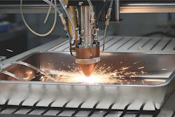 A close-up of a laser-directed energy deposition (LDED) system fabricating the novel AI-designed ultra-high strength steel, which achieves a rare balance of strength and ductility, excellent corrosion resistance, and requires only six hours of single-step heat treatment at low cost.