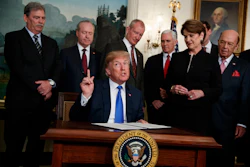 President Donald Trump speaks before he signs a presidential memorandum imposing tariffs and investment restrictions on China in the Diplomatic Reception Room of the White House, March 22, 2018, in Washington.
