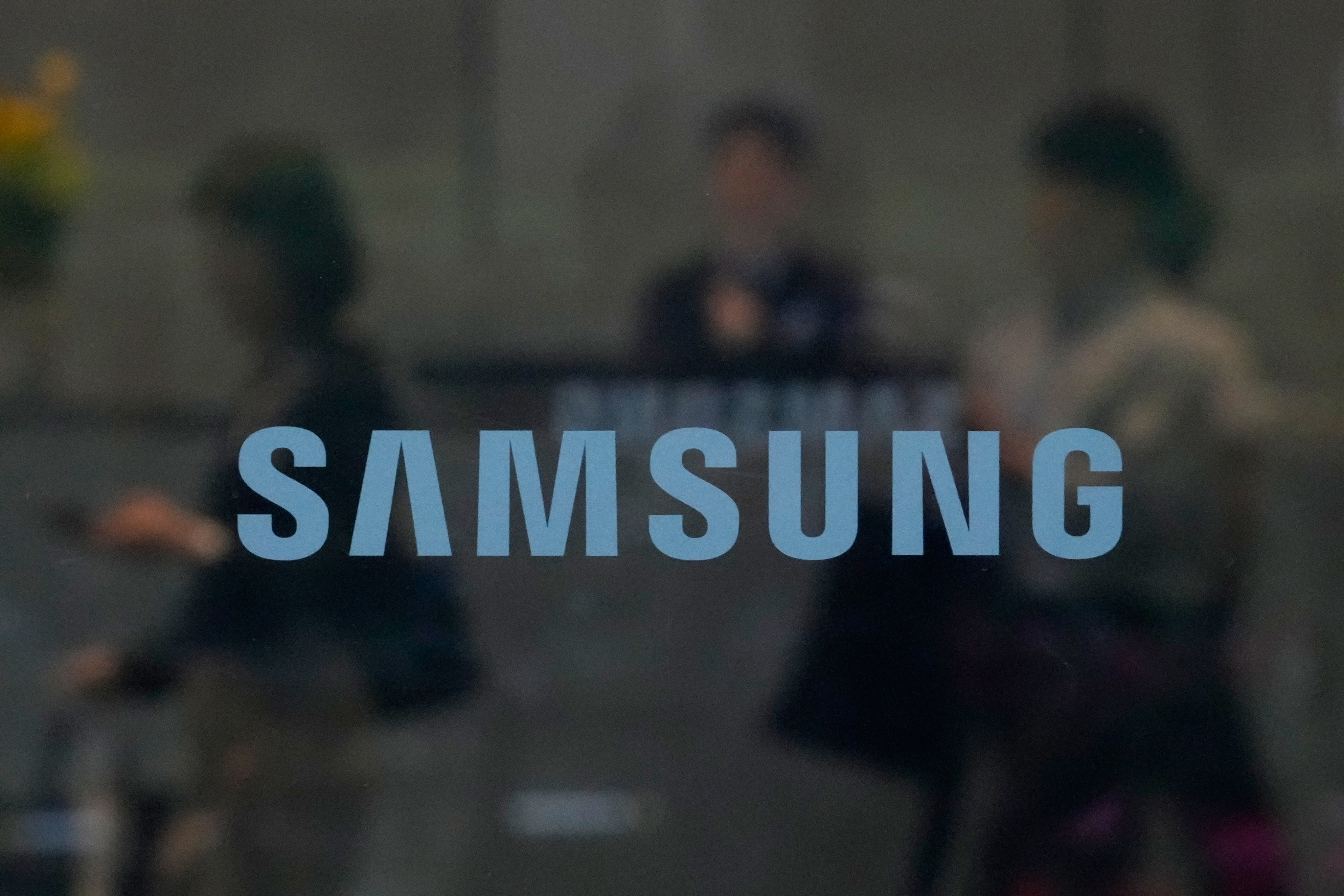 The logo of the Samsung Electronics Co. is seen at its office in Seoul, South Korea, Wednesday, May 20, 2026.