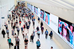 Commuters walk through a corridor in the World Trade Center Transportation Hub in New York on June 21, 2019.