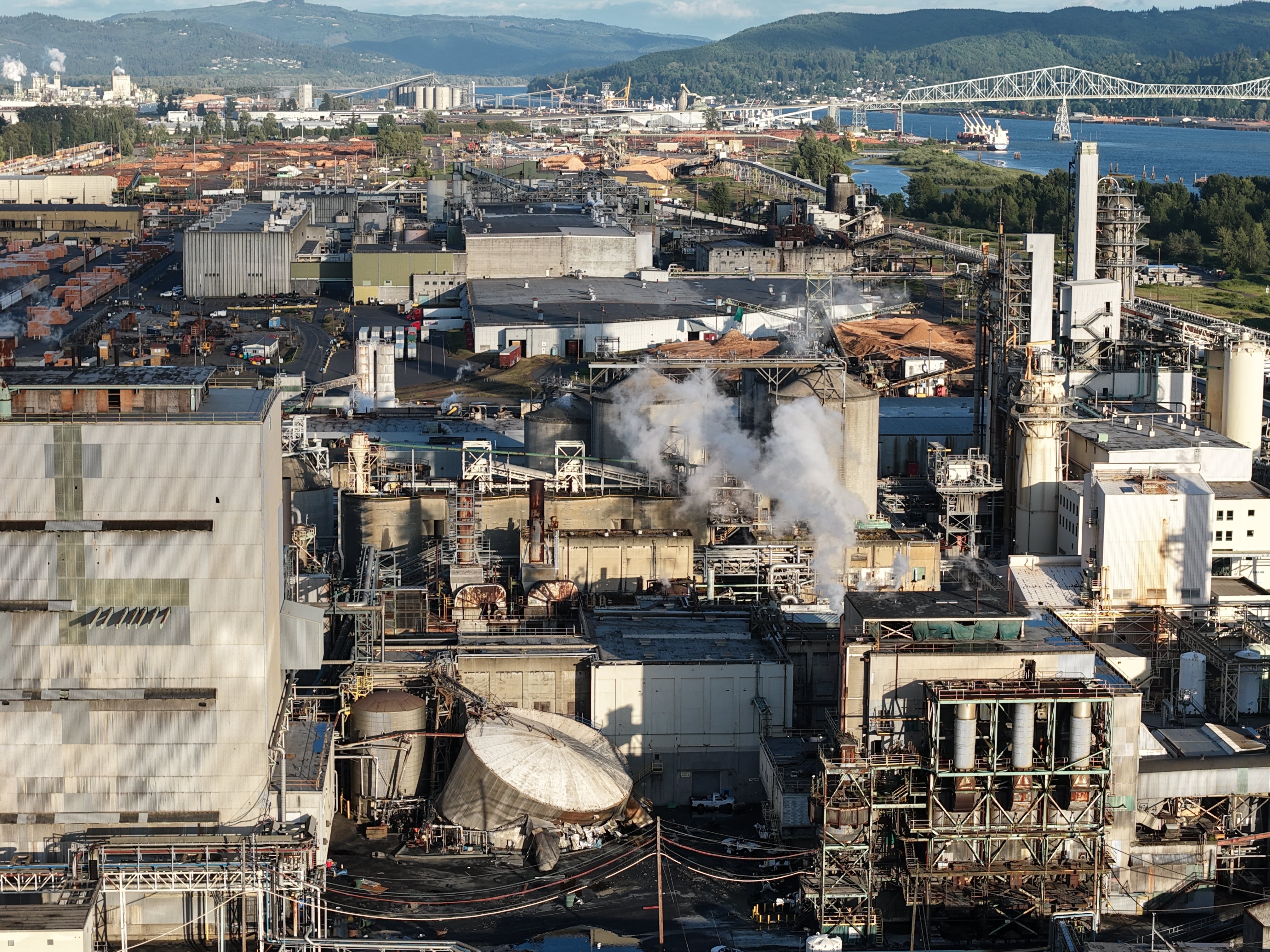 Damage is seen at Nippon Dynawave Packaging Co., after a tank containing hazardous liquid imploded, on Tuesday, May 26, 2026, in Longview, Wash.