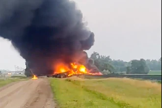 Smoke fills the sky after a train derailment near Carrington, N.D., July 5, 2024