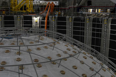 Workers labor near the cosmic detector housed underground at the Jiangmen Underground Neutrino Observatory in Kaiping in southern China's Guangdong province, Oct. 11, 2024.