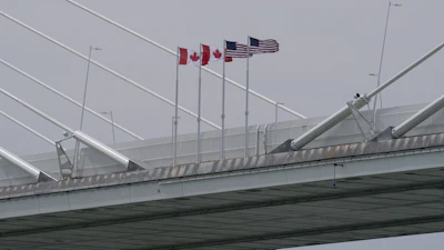 Canadian and American flags on the Gordie Howe Bridge between Windsor, Ontario and Detroit, May 22, 2026.