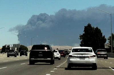 Smoke from a medical supply warehouse fire in Tracy, Calif., is seen from Livermore on Thursday, June 11, 2026.