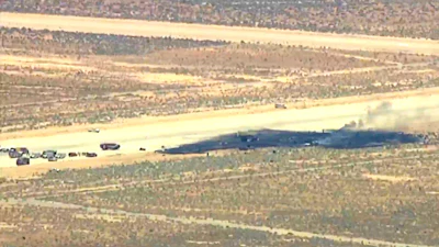 This image taken from video provided by KABC shows law enforcement responding to the scene of an aircraft crash, Monday, June 15, 2026, near Edwards Air Force Base, Calif.
