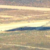 This image taken from video provided by KABC shows law enforcement responding to the scene of an aircraft crash, Monday, June 15, 2026, near Edwards Air Force Base, Calif.