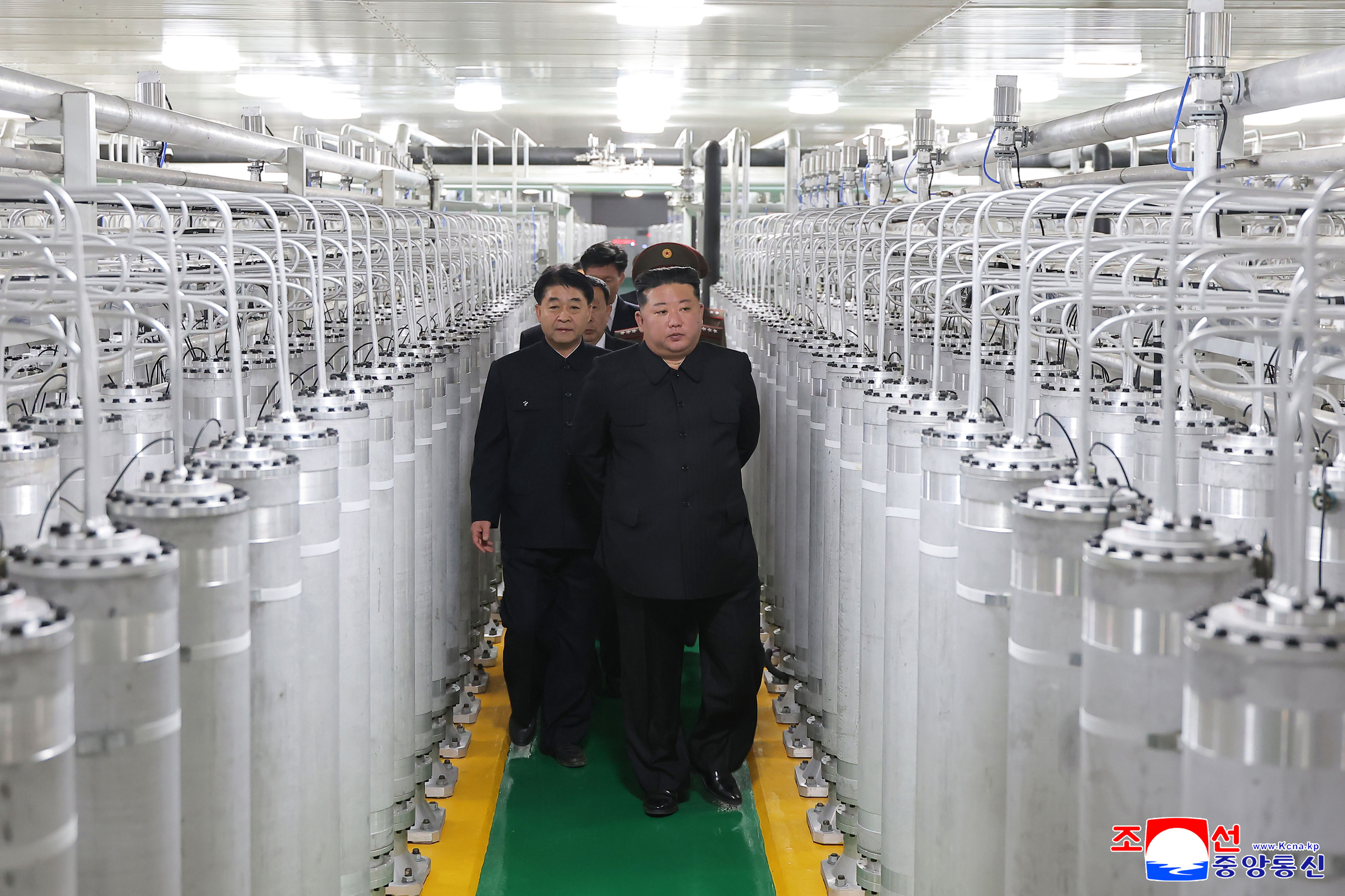 In this photo provided by the North Korean government, its leader Kim Jong Un, front right, visits a new facility to produce nuclear bomb fuels at an undisclosed place in North Korea Wednesday, June 3, 2026. Independent journalists were not given access to cover the event depicted in this image distributed by the North Korean government. The content of this image is as provided and cannot be independently verified. Korean language watermark on image as provided by source reads: 'KCNA' which is the abbreviation for Korean Central News Agency.