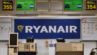 The Ryanair desk is seen, Aug. 10, 2018, at the Barajas airport in Madrid, Spain.