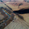 This photo taken with a drone shows the area where the ruptured Keystone pipeline dumped oil into a creek in Washington County, Kan., Dec. 9, 2022.