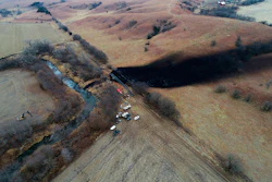 This photo taken with a drone shows the area where the ruptured Keystone pipeline dumped oil into a creek in Washington County, Kan., Dec. 9, 2022.