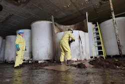 Sludge pours out of a vat of fermenting fish sauce in an abandoned factory, St. Mary's, Newfoundland and Labrador, July 28, 2026.