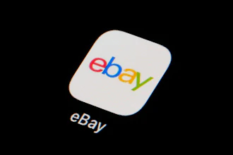 The eBay app icon is seen on a smartphone, Feb. 28, 2023, in Marple Township, Pa.