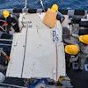 In this photo released by Pakistan Navy, Pakistan Navy personnel shift the wreckage of a cargo plane of the private carrier K2 Airways into a naval ship after recovering them from deep sea near Omara, a town some 360 kms. (220 miles) west of Karachi, Pakistan, Wednesday, July 8, 2026.