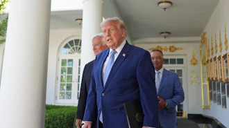 President Donald Trump arrives with Los Angeles Dodgers manager Dave Roberts and owner Mark Walter for an event to honor the 2025 World Series champions Los Angeles Dodgers in the Rose Garden of the White House, Thursday, July 23, 2026, in Washington.