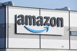 An Amazon company logo marks the facade of a building, March 18, 2022, in Schoenefeld near Berlin.