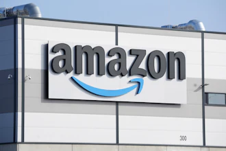 An Amazon company logo marks the facade of a building, March 18, 2022, in Schoenefeld near Berlin.