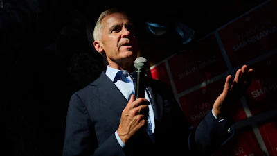 Prime Minister Mark Carney speaks at a campaign event for Liberal Party Beaches-East York byelection candidate Tanveer Shahnawaz at The Stone Lion Pub, Toronto, Aug. 5, 2026.