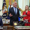 Health and Human Services Secretary Robert F. Kennedy Jr. speaks alongside President Donald Trump and Heidi Overton, deputy director of the White House Domestic Policy Council, in the Oval Office, Aug. 10, 2026.